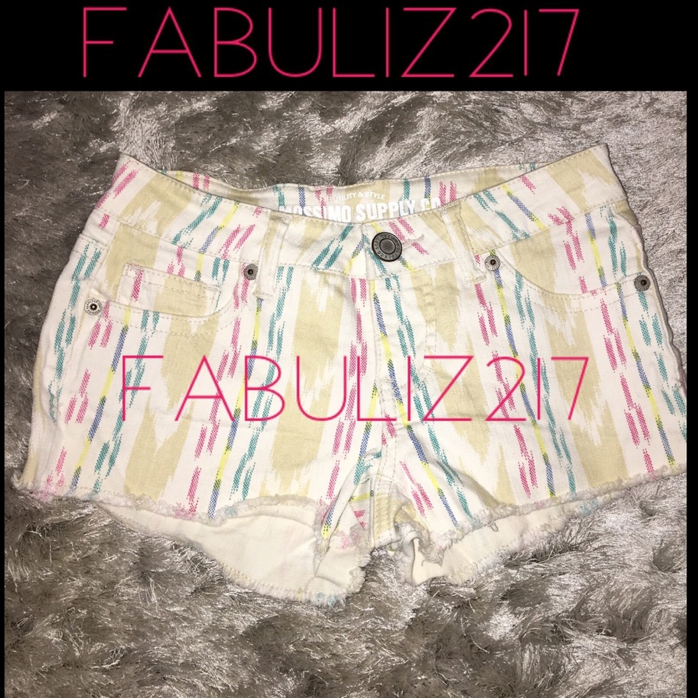 Colorful tribal style printed denim short shorts.